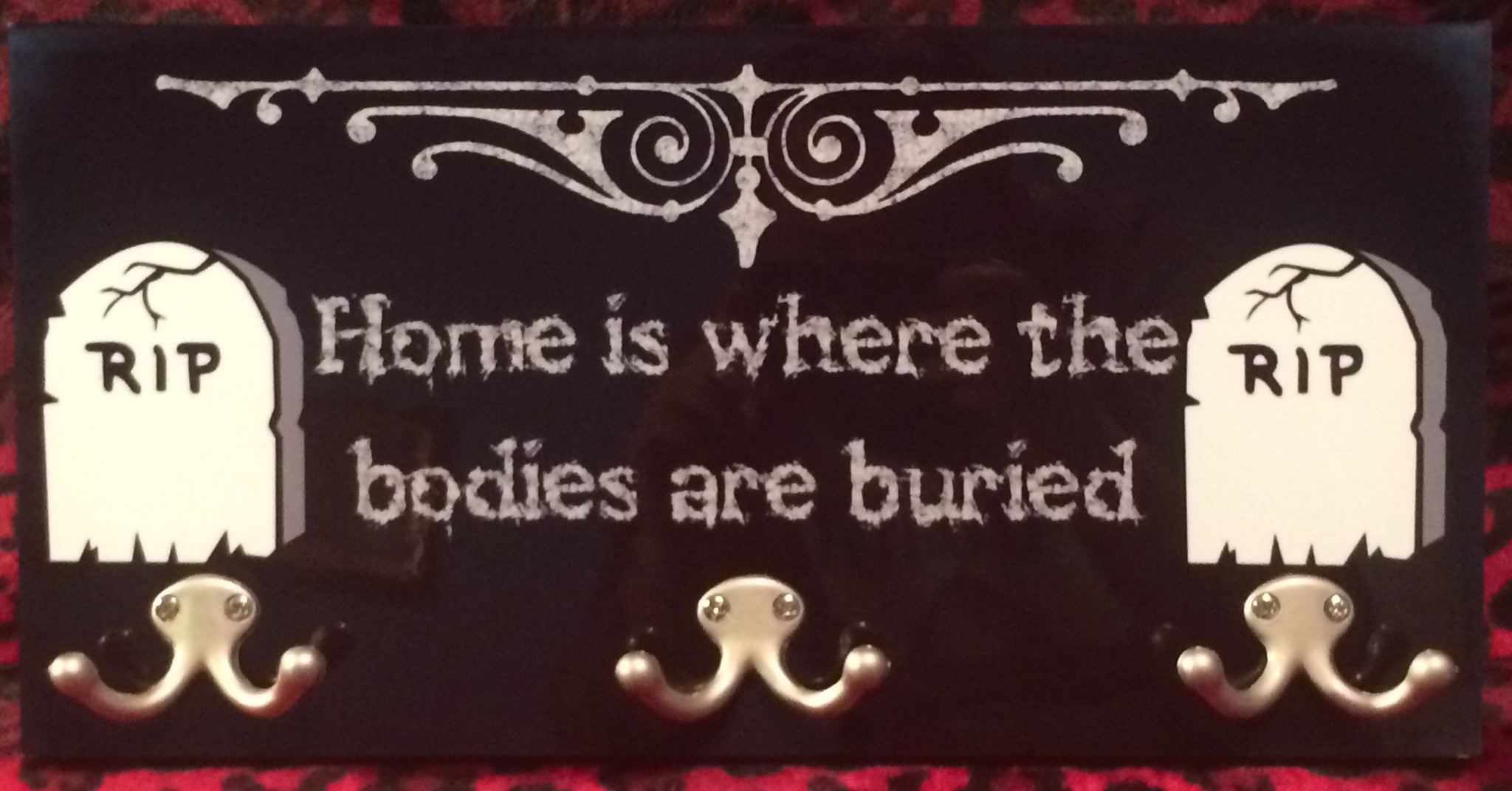 Home Is Where The Bodies Are Buried Coat Hanger